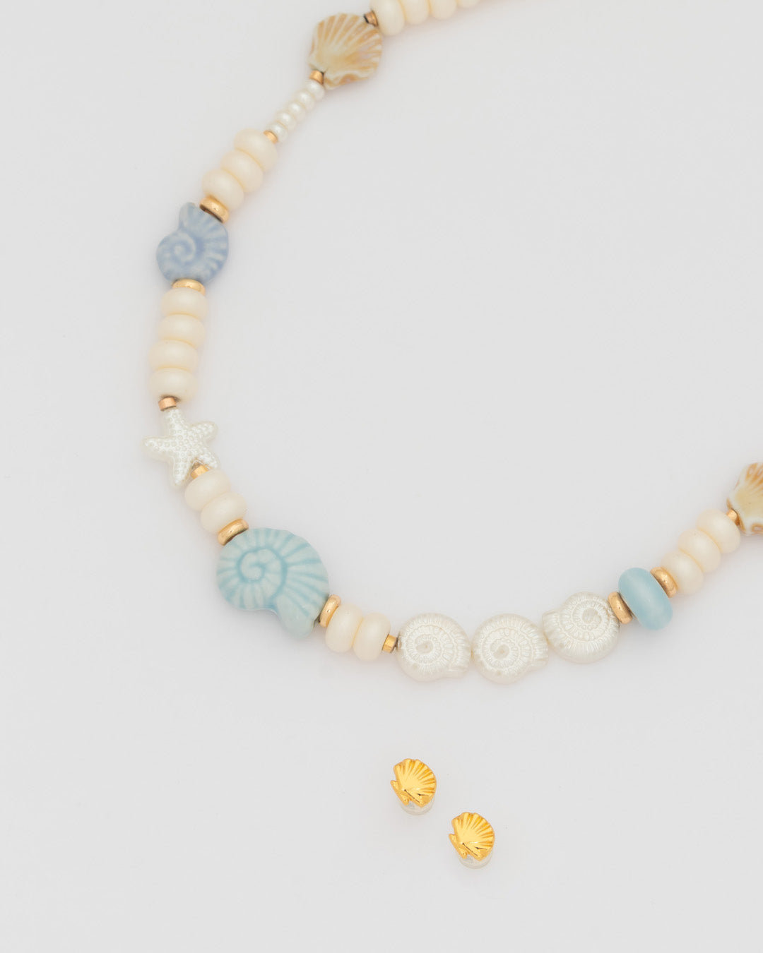 Collar Caracoles + Aretes