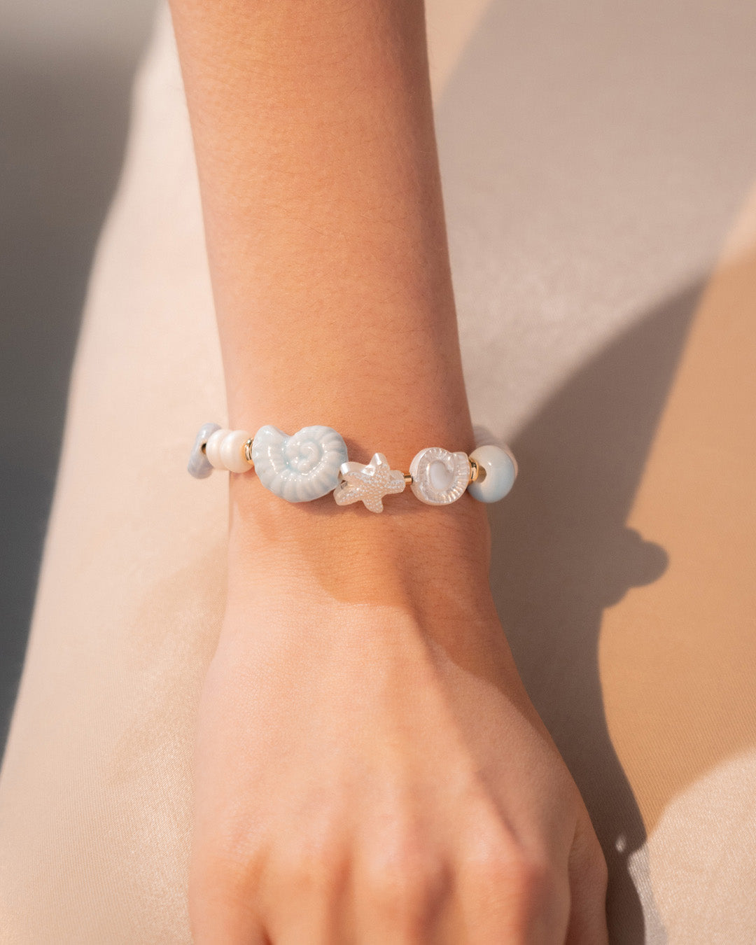 Pulsera Caracol + Aretes