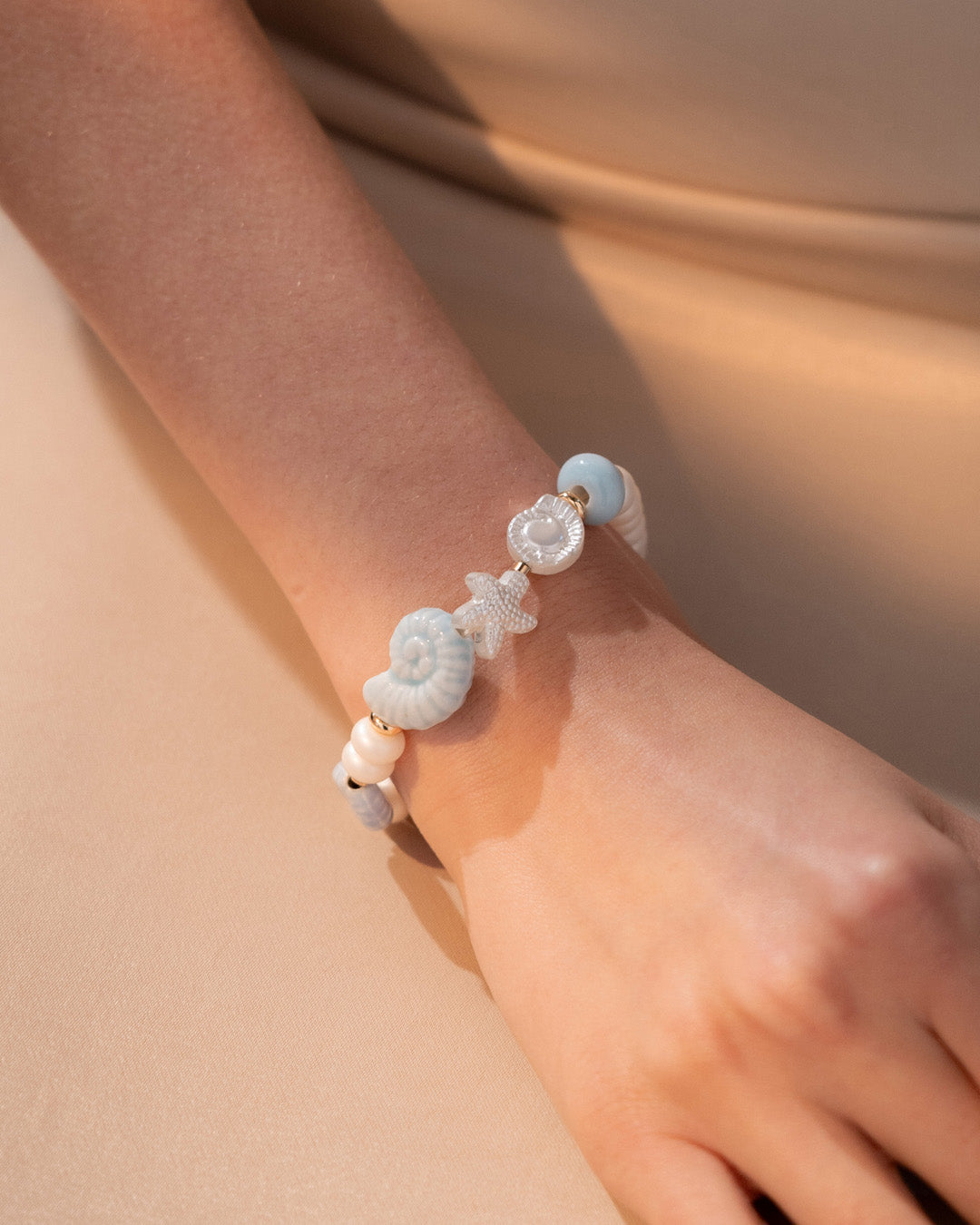 Pulsera Caracol + Aretes