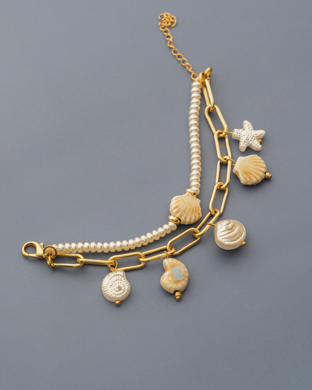 Pulsera 2 en 1 Caracoles + Aretes